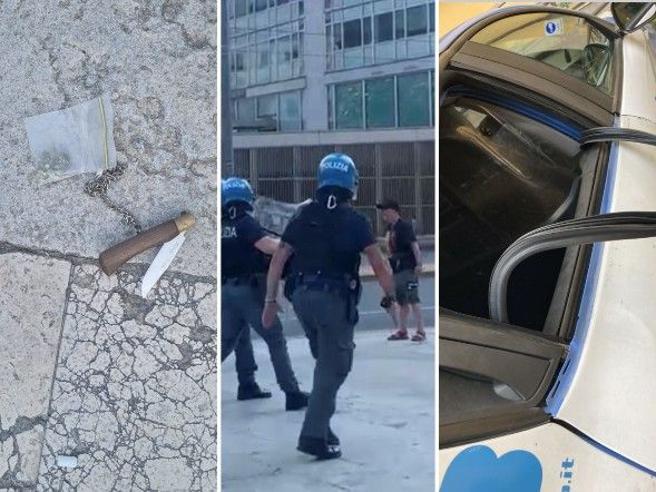 milano poliziotti minacciati coltello skateboard
