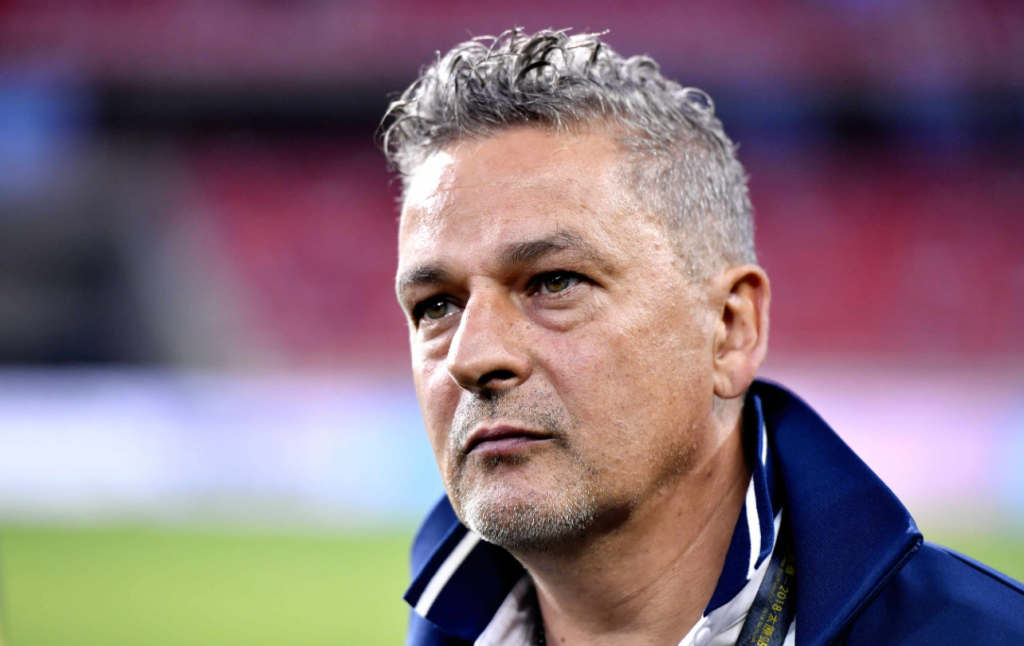 Baggio picchiato rapinato